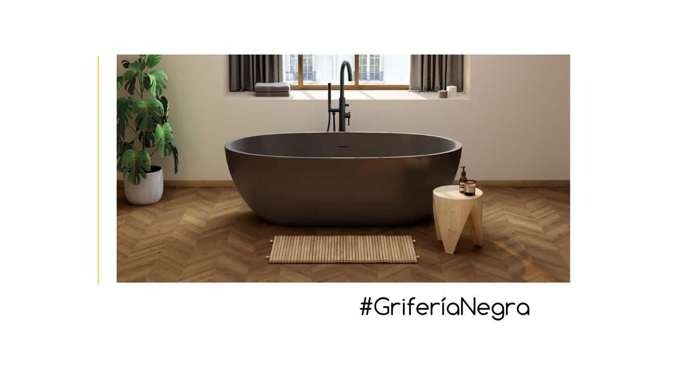 Grifería negra en baño moderno de diseño en Zaragoza.